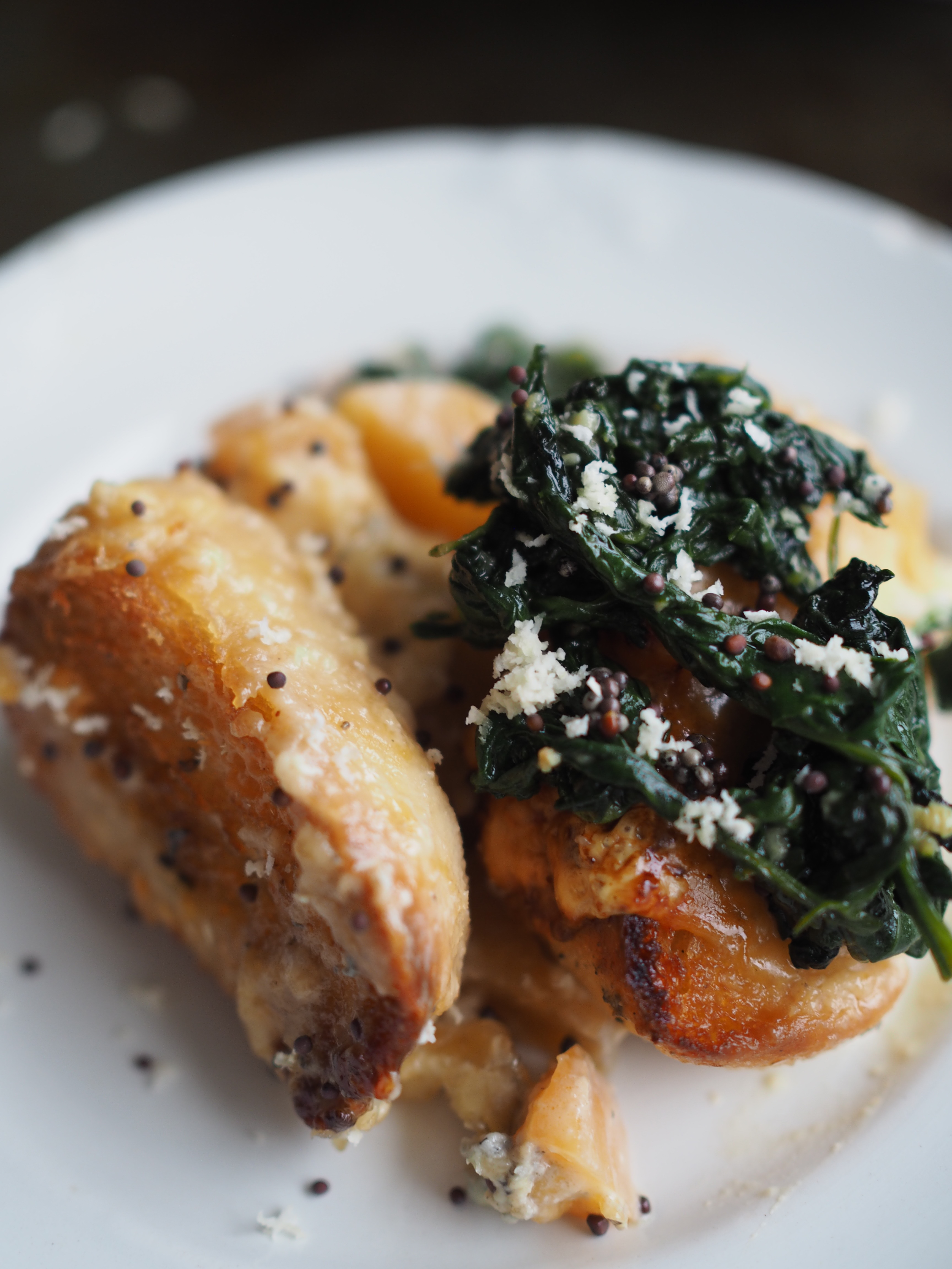 Cheesy Rutabaga & Beer Bake served with Vinegary Greens, Toasted Mustard Seeds and Horseradish