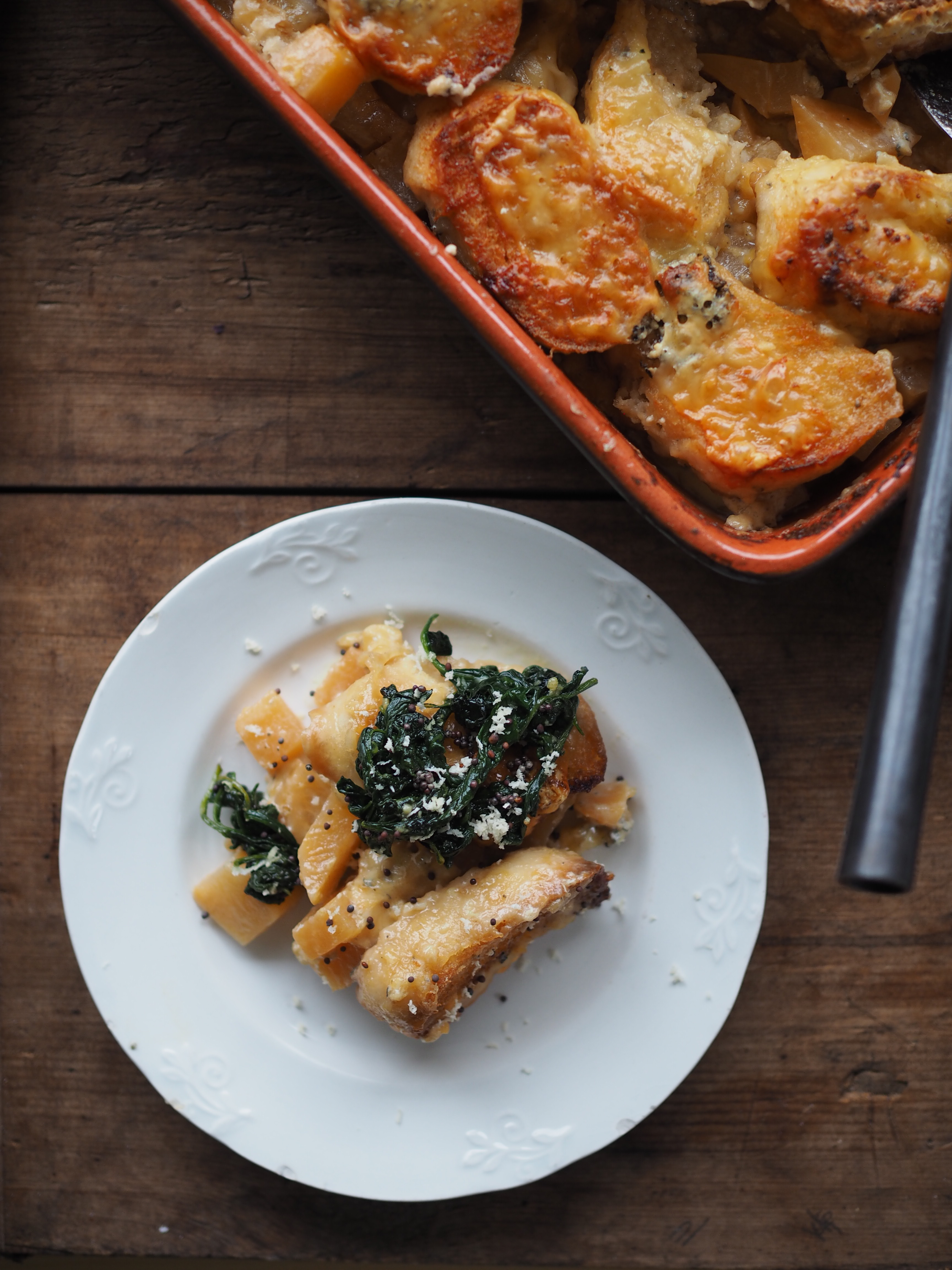 Cheesy Rutabaga & Beer Bake served with Vinegary Greens, Toasted Mustard Seeds and Horseradish