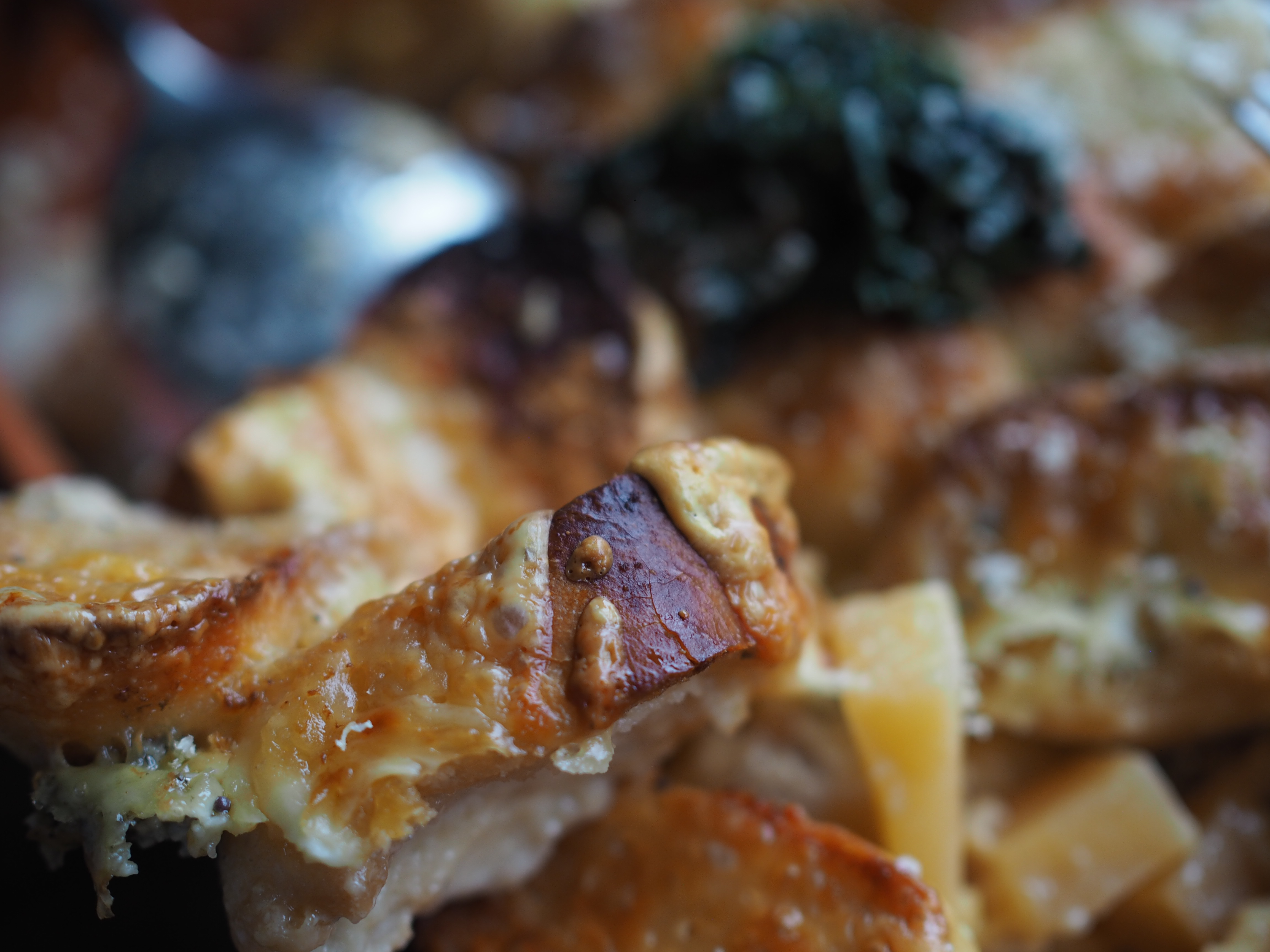 Cheesy Rutabaga & Beer Bake served with Vinegary Greens, Toasted Mustard Seeds and Horseradish