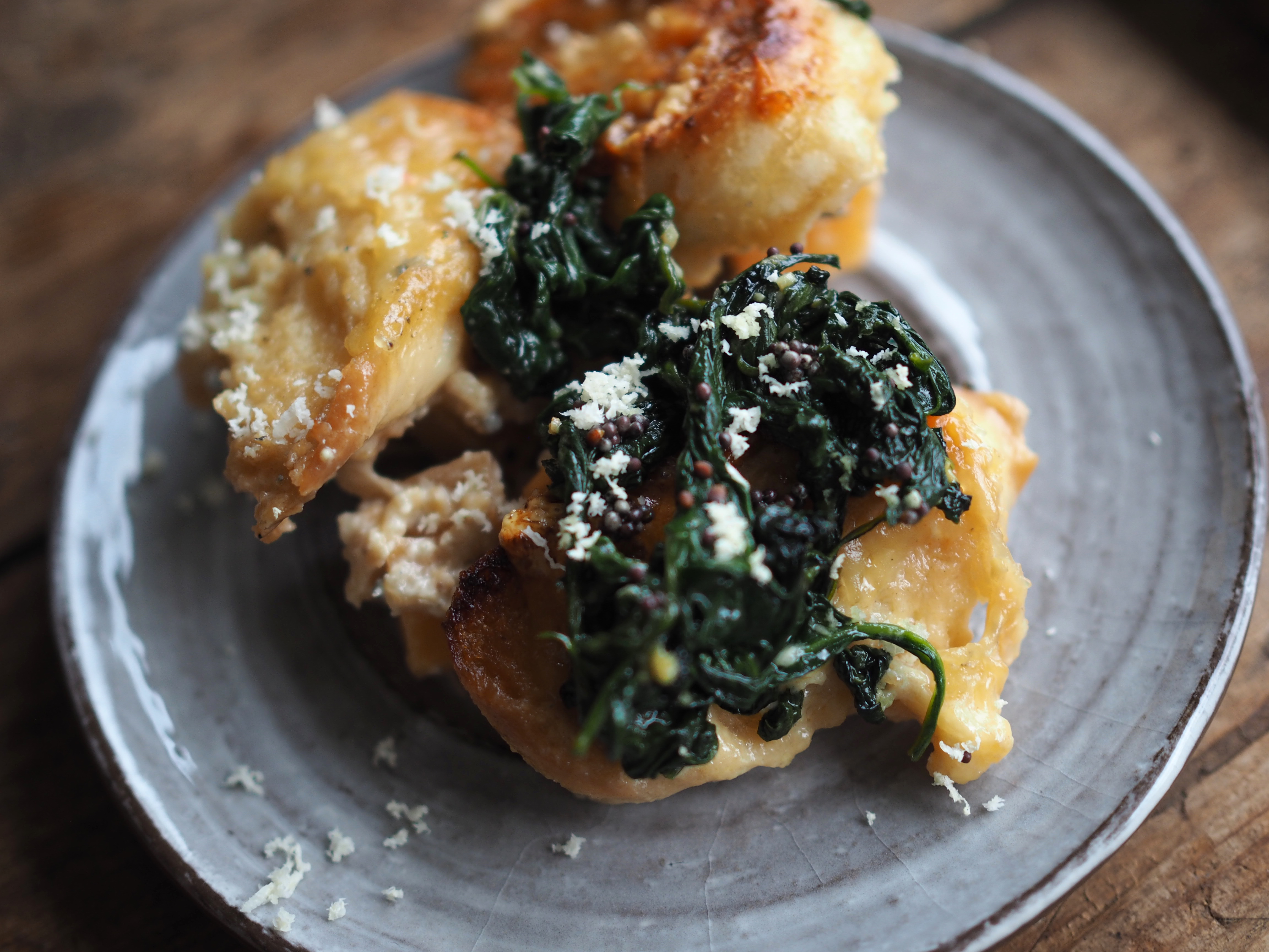 Cheesy Rutabaga & Beer Bake served with Vinegary Greens, Toasted Mustard Seeds and Horseradish