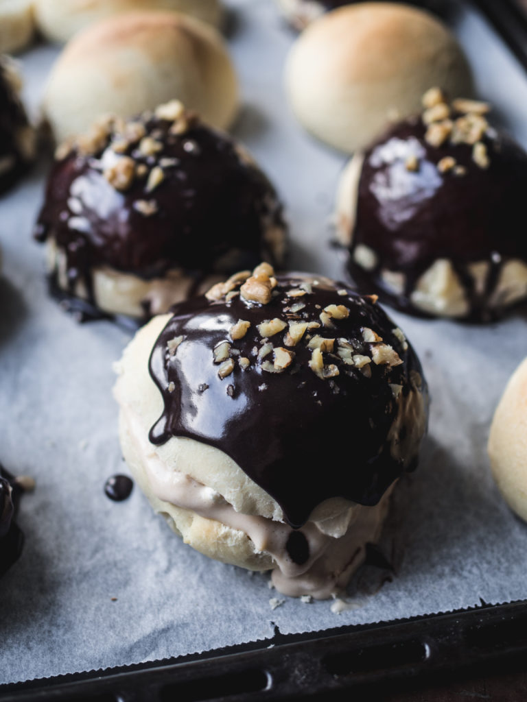 Sweet Buns with a Chocolate Glaze, Walnut Custard and Cream (Fastelavnsboller med valnøtterkrem og sjokoladeglasur)
